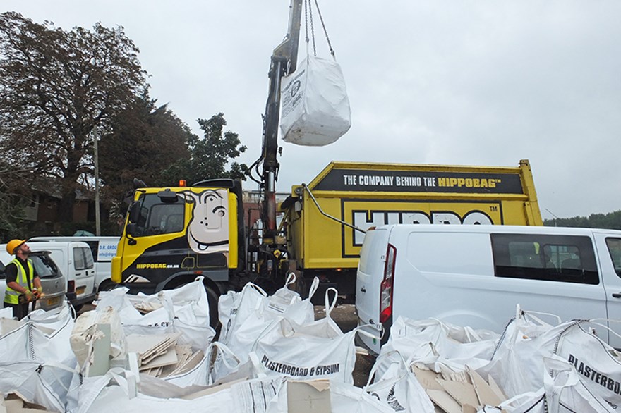 HIPPO collects a HIPPOBAG full of plasterboard with craned vehicle