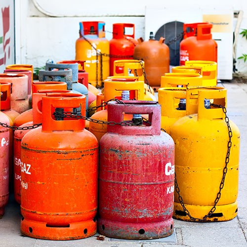 Old used gas bottles and cylinders