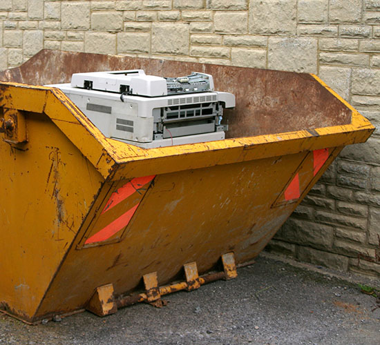 Photocopier incorrectly disposed of in a skip