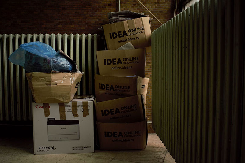 A pile of waste stacked in a corner of a store room