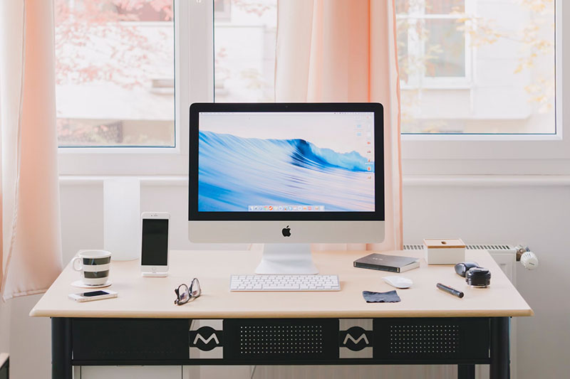 A tidy home office desk space with no clutter