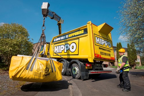 A HIPPOBAG collection being craned into vehicle