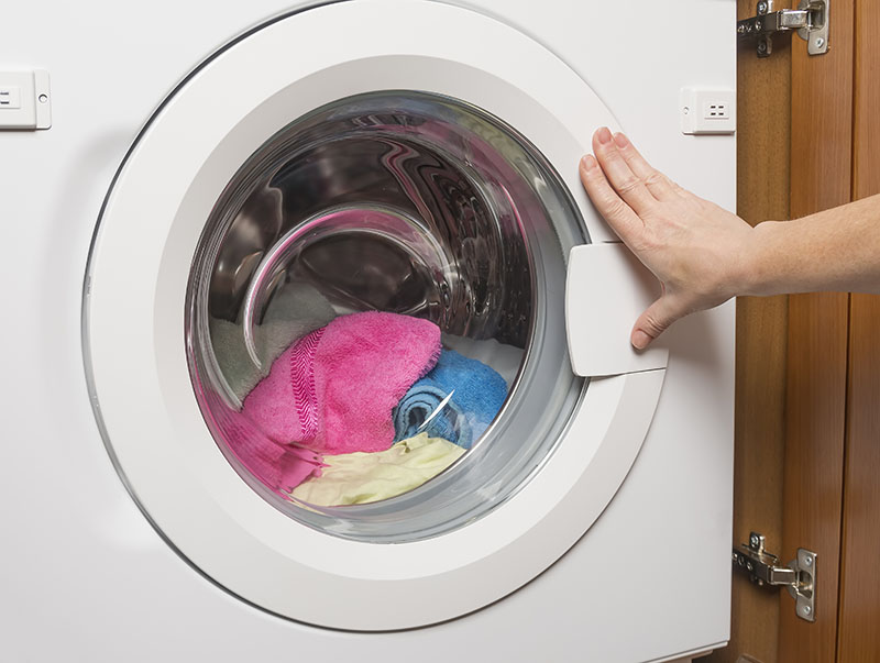 An integrated washing machine with the cabinet door open