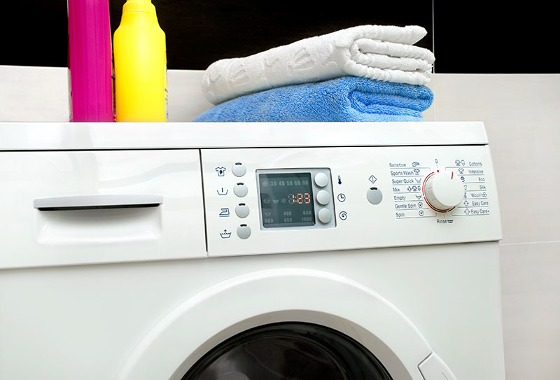 Washing machine with cleaning products placed on top