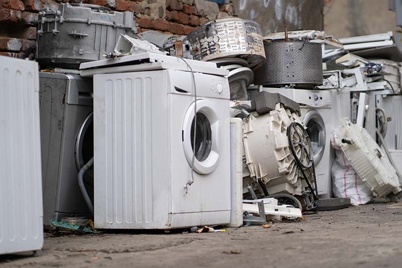 Washing machine parts stored ready for recycling